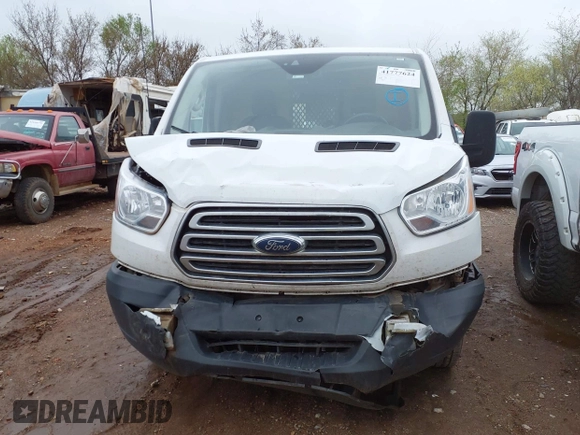 2018 Ford Transit z VIN 1FTYR1ZM6JKB17933, wystawiony jako IAAI lot #41777624 z przebiegiem 225 123 mil mil oraz . Historia ofert i sprzedaży dostępna na DreamBid. Obrazek 12.