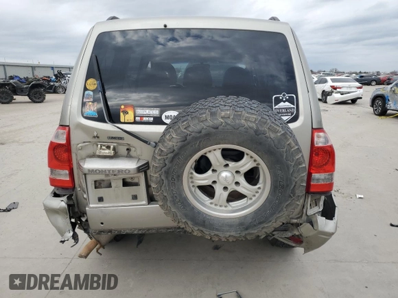 2003 Mitsubishi Montero LTD with VIN JA4NW51S63J019484, listed as a Copart auction lot 86089024 with 0 mi miles and Salvage Title. Bid and sale history available at carsss.com. Image 6.