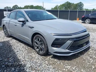 2024 Hyundai Sonata SEL z VIN KMHL64JA3RA398298, wystawiony jako IAAI lot #42462477 z przebiegiem 21 843 mil mil oraz . Historia ofert i sprzedaży dostępna na DreamBid. Obrazek 1.