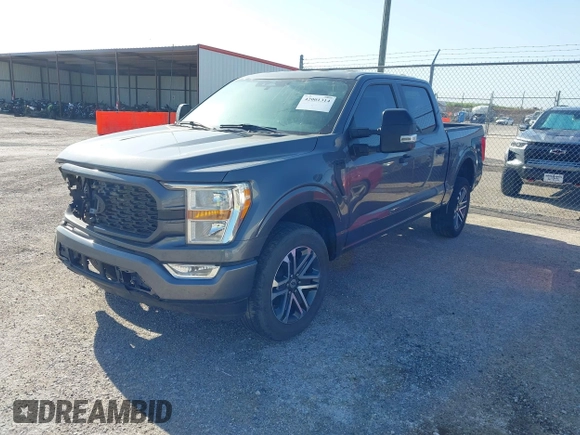 2023 Ford F-150 XL with VIN 1FTFW1E51PKF71272, listed as a IAAI auction lot 42001314 with 5,314 mi miles. Bid and sale history available at carsss.com. Image 2.