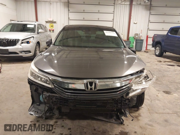 2016 Honda Accord Touring with VIN 1HGCR3F92GA029435, listed as a IAAI auction lot 42180794 with 132,658 mi miles and . Bid and sale history available at DreamBid. Image 13.