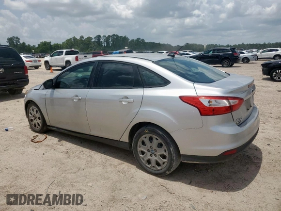 2012 Ford Focus SE with VIN 1FAHP3F29CL287498, listed as a Copart auction lot 61476855 with 139,801 mi miles and Salvage title. Bid and sale history available at DreamBid. Image 2.