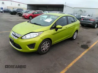 2012 Ford Fiesta SE with VIN 3FADP4BJ3CM159435, listed as a IAAI auction lot 38286404 with 131,808 mi miles and . Bid and sale history available at DreamBid. Image 2.