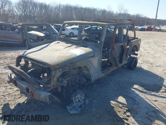 2013 Jeep Wrangler Unlimited Sport z VIN 1C4BJWDG5DL591947, wystawiony jako IAAI lot #41753728 z przebiegiem Nie podano mil oraz . Historia ofert i sprzedaży dostępna na DreamBid. Obrazek 2.