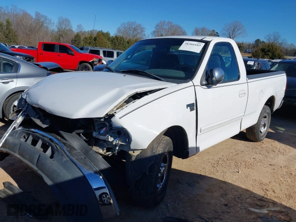 2001 Ford F-150 XL z VIN 1FTRF17L61NB04122, wystawiony jako IAAI lot #38304103 z przebiegiem 186 816 mil mil oraz . Historia ofert i sprzedaży dostępna na DreamBid. Obrazek 2.
