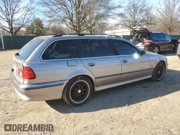 1999 BMW 5 Series 528iAt with VIN WBADP6334XBV60122, listed as a Copart auction lot 44493325 with 218,746 mi miles and Salvage Title. Bid and sale history available at carsss.com. Image 3.