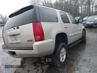2007 GMC Yukon SLT z VIN 1GKFK13037J282696, wystawiony jako IAAI lot #41996538 z przebiegiem 143 607 mil mil oraz . Historia ofert i sprzedaży dostępna na DreamBid. Obrazek 4.