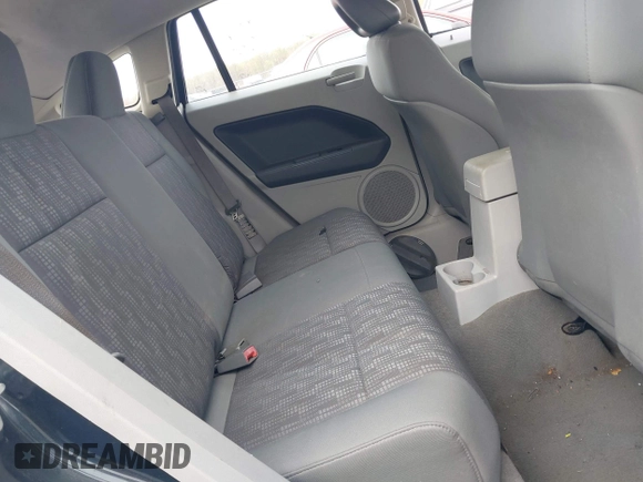 2007 Dodge Caliber with VIN 1B3HB28B17D350160, listed as a IAAI auction lot 41988479 with 174,949 mi miles. Bid and sale history available at carsss.com. Image 8.