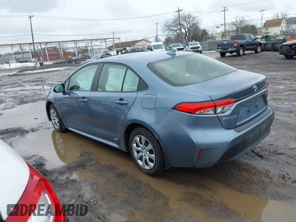 2023 Toyota Corolla Hybrid LE with VIN JTDBDMHE0P3005163, listed as a IAAI auction lot 41631670 with 10,956 mi miles. Bid and sale history available at carsss.com. Image 3.