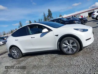 2021 Tesla Model Y Standard Range with VIN 5YJYGDED9MF110697, listed as a IAAI auction lot 41707730 with Not Provided miles and . Bid and sale history available at carsss.com. Image 13.