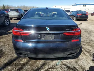 2017 BMW 7 Series 750i xDrive with VIN WBA7B0C55HG527032, listed as a Copart auction lot 52026415 with 67,722 mi miles and Clean title. Bid and sale history available at DreamBid. Image 6.
