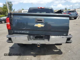 2018 Chevrolet Silverado 1500 LT with VIN 1GCRCREH5JZ261185, listed as a Copart auction lot 51847875 with 103,082 mi miles and Salvage Title. Bid and sale history available at DreamBid. Image 6.