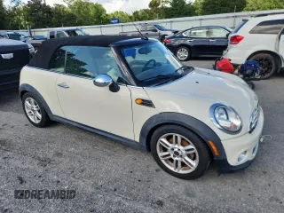 2011 MINI Convertible with VIN WMWZN3C59BTZ78433, listed as a Copart auction lot 65509575 with 102,800 mi miles and Clean title. Bid and sale history available at DreamBid. Image 4.