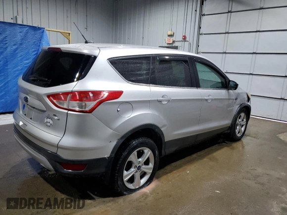 2014 Ford Escape SE with VIN 1FMCU9GX1EUC26584, listed as a Copart auction lot 49311145 with 130,545 mi miles and Salvage Title. Bid and sale history available at carsss.com. Image 3.