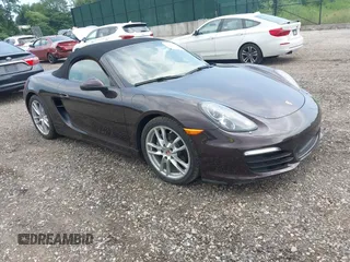 2014 Porsche Boxster with VIN WP0CA2A81ES121030, listed as a IAAI auction lot 42690064 with 47,257 mi miles and . Bid and sale history available at DreamBid. Image 1.