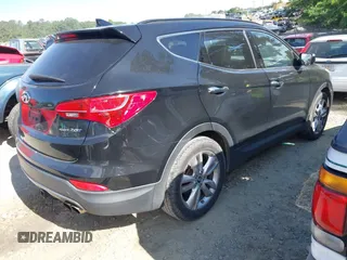 2013 Hyundai Santa Fe Sport z VIN 5XYZU3LA7DG087980, wystawiony jako IAAI lot #42324342 z przebiegiem 160 941 mil mil oraz . Historia ofert i sprzedaży dostępna na DreamBid. Obrazek 4.