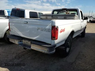 1997 Ford F-250 z VIN 1FTHF26F3VEB25299, wystawiony jako Copart lot #79120094 z przebiegiem 232 954 mil mil oraz Szkoda całkowita • Salvage title. Historia ofert i sprzedaży dostępna na DreamBid. Obrazek 3.