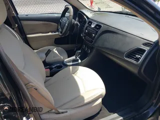 2012 Chrysler 200 Touring with VIN 1C3CCBBB8CN106867, listed as a IAAI auction lot 42233186 with 136,276 mi miles and . Bid and sale history available at DreamBid. Image 5.