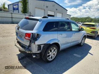 2013 Dodge Journey Crew with VIN 3C4PDCDG5DT599840, listed as a Copart auction lot 62542795 with 102,235 mi miles and Salvage title. Bid and sale history available at DreamBid. Image 3.