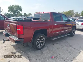 2014 GMC Sierra 1500 SLT with VIN 3GTU2VEC8EG100328, listed as a IAAI auction lot 41867831 with 193,148 mi miles and . Bid and sale history available at DreamBid. Image 4.