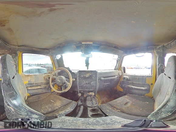 2009 Jeep Wrangler X with VIN 1J4FA24119L754391, listed as a Copart auction lot 56067805 with 118,117 mi miles and Salvage title. Bid and sale history available at DreamBid. Image 15.