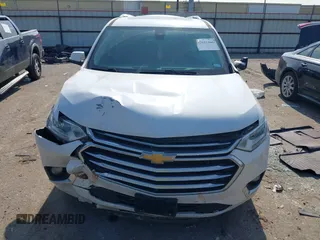 2020 Chevrolet Traverse High Country with VIN 1GNEVNKWXLJ135322, listed as a IAAI auction lot 42042466 with 105,748 mi miles and . Bid and sale history available at DreamBid. Image 12.