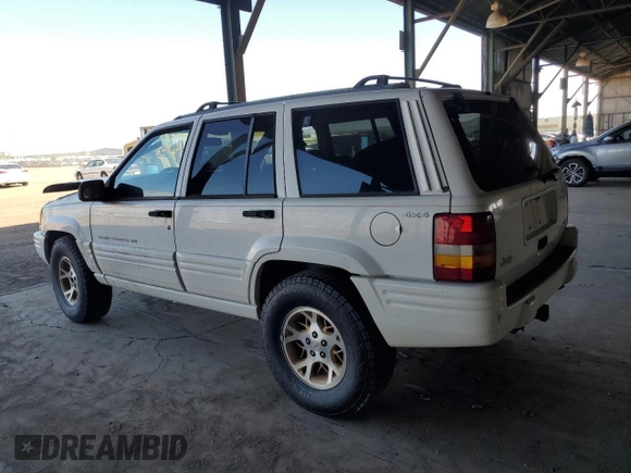 1996 Jeep Grand Cherokee with VIN 1J4EZ78Y9TC104398, listed as a Copart auction lot 69706254 with Not provided miles and Salvage title. Bid and sale history available at DreamBid. Image 2.