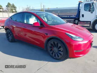 2021 Tesla Model Y Performance with VIN 5YJYGDEF5MF211592, listed as a IAAI auction lot 41766033 with 59,694 mi miles. Bid and sale history available at carsss.com. Image 1.