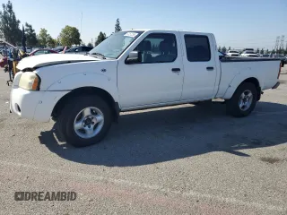 2004 Nissan Frontier XE z VIN 1N6ED29X94C423389, wystawiony jako Copart lot #57357255 z przebiegiem 195 700 mil mil oraz Szkoda całkowita • Salvage title. Historia ofert i sprzedaży dostępna na DreamBid. Obrazek 1.