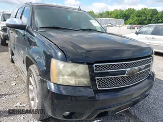 2011 Chevrolet Suburban LT z VIN 1GNSCJE0XBR133465, wystawiony jako IAAI lot #42294755 z przebiegiem 328 824 mil mil oraz . Historia ofert i sprzedaży dostępna na DreamBid. Obrazek 6.