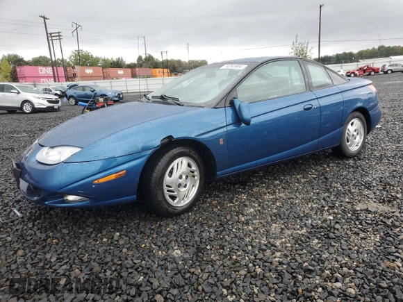 2001 Saturn SC z VIN 1G8ZR12791Z118164, wystawiony jako Copart lot #74393904 z przebiegiem 158 308 mil mil oraz Szkoda całkowita • Salvage title. Historia ofert i sprzedaży dostępna na DreamBid. Obrazek 1.