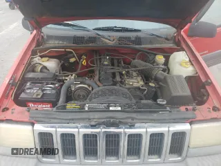 1998 Jeep Grand Cherokee Laredo with VIN 1J4FX58S3WC144684, listed as a Copart auction lot 67226694 with 106,602 mi miles and Clean Title. Bid and sale history available at carsss.com. Image 12.