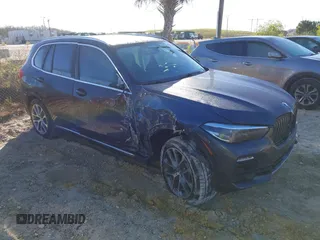 2020 BMW X5 sDrive40i with VIN 5UXCR4C06LLE30805, listed as a IAAI auction lot 41427760 with 57,883 mi miles and . Bid and sale history available at DreamBid. Image 1.