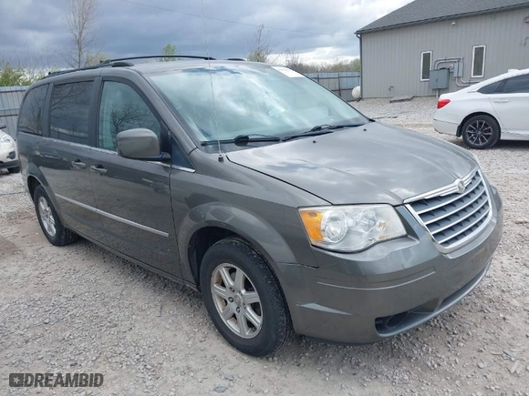 2010 Chrysler Town & Country Touring with VIN 2A4RR5D11AR194116, listed as a IAAI auction lot 42025043 with 197,826 mi miles. Bid and sale history available at carsss.com. Image 1.