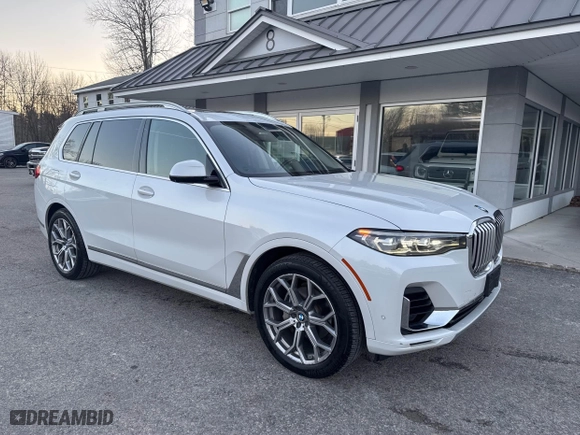 2020 BMW X7 xDrive40i with VIN 5UXCW2C05L9A03397, listed as a IAAI auction lot 41381437 with 141,656 mi miles. Bid and sale history available at carsss.com. Image 1.