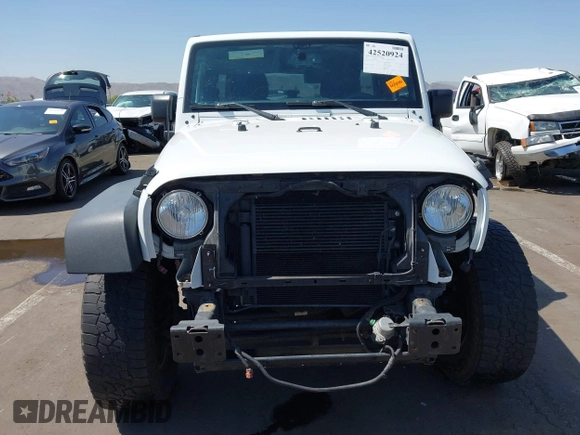 2016 Jeep Wrangler Unlimited Sport z VIN 1C4BJWDG4GL288615, wystawiony jako IAAI lot #42520924 z przebiegiem 113 594 mil mil oraz . Historia ofert i sprzedaży dostępna na DreamBid. Obrazek 13.