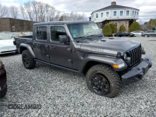 2023 Jeep Gladiator Sport S with VIN 1C6HJTAG9PL572388, listed as a Copart auction lot 53346475 with 11,081 mi miles and Salvage title. Bid and sale history available at DreamBid. Image 4.