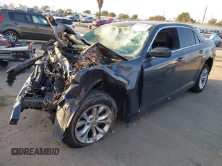2016 Chrysler 300 Anniversary Edition with VIN 2C3CCAAG7GH211860, listed as a IAAI auction lot 41562358 with Not Provided miles and . Bid and sale history available at DreamBid. Image 2.