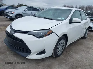 2019 Toyota Corolla L with VIN 5YFBURHE0KP889909, listed as a IAAI auction lot 41888953 with 130,529 mi miles. Bid and sale history available at carsss.com. Image 2.