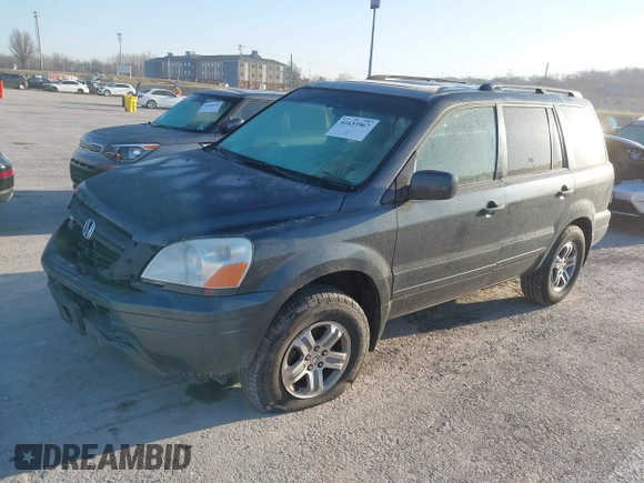 2005 Honda Pilot EX-L with VIN 5FNYF18505B036545, listed as a IAAI auction lot 41633967 with 184,038 mi miles. Bid and sale history available at carsss.com. Image 2.