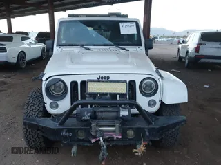 2014 Jeep Wrangler Unlimited Sahara with VIN 1C4BJWEG7EL204489, listed as a IAAI auction lot 41255239 with 68,803 mi miles and . Bid and sale history available at DreamBid. Image 12.