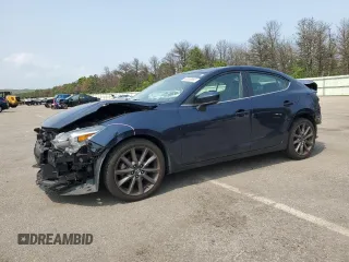 2018 Mazda 3 Grand Touring z VIN 3MZBN1W39JM270986, wystawiony jako Copart lot #60060665 z przebiegiem 92 540 mil mil oraz Szkoda całkowita • Salvage title. Historia ofert i sprzedaży dostępna na DreamBid. Obrazek 1.