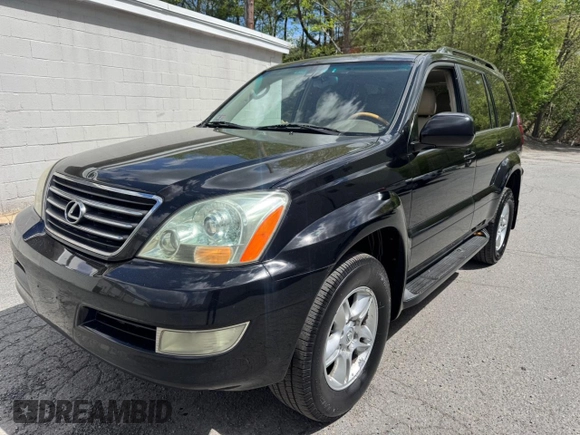 2005 Lexus GX 470 with VIN JTJBT20X050079831, listed as a Copart auction lot 56405105 with 390,415 mi miles and Clean Title. Bid and sale history available at DreamBid. Image 2.