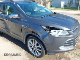 2015 Ford Escape SE with VIN 1FMCU9G97FUA89251, listed as a IAAI auction lot 41919240 with 148,472 mi miles and . Bid and sale history available at DreamBid. Image 6.