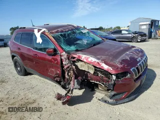 2019 Jeep Cherokee Latitude Plus with VIN 1C4PJMLN6KD174564, listed as a Copart auction lot 56365255 with 87,230 mi miles and Salvage title. Bid and sale history available at DreamBid. Image 4.