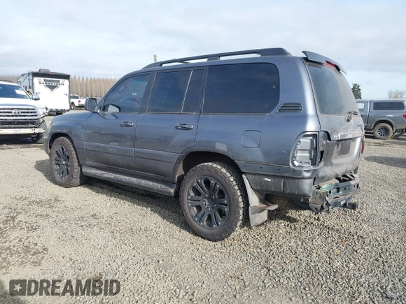 2005 Toyota Land Cruiser z VIN JTEHT05J852069392, wystawiony jako IAAI lot #41450782 z przebiegiem 187 949 mil mil oraz . Historia ofert i sprzedaży dostępna na DreamBid. Obrazek 3.