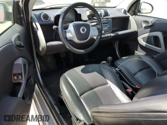 2012 Smart fortwo Pure z VIN WMEEJ3BA9CK561933, wystawiony jako Copart lot #53356835 z przebiegiem 67 587 mil mil oraz Nie do naprawy • Non repairable. Historia ofert i sprzedaży dostępna na DreamBid. Obrazek 8.