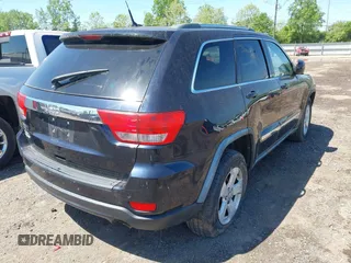 2011 Jeep Grand Cherokee Laredo with VIN 1J4RR4GG8BC525701, listed as a IAAI auction lot 42240431 with 198,921 mi miles and . Bid and sale history available at DreamBid. Image 4.