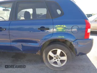 2005 Hyundai Tucson GL with VIN KM8JM12B85U233228, listed as a IAAI auction lot 42051627 with 170,742 mi miles. Bid and sale history available at carsss.com. Image 15.