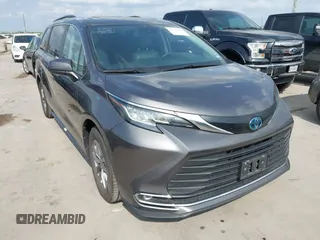 2023 Toyota Sienna XLE with VIN 5TDYRKEC4PS163555, listed as a IAAI auction lot 42102074 with 56,906 mi miles. Bid and sale history available at carsss.com. Image 1.